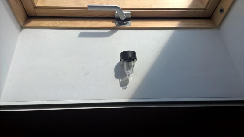 Solar lamp wall mount for roof windows