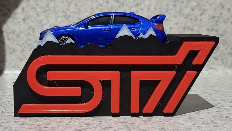 STI Desk Logo with Die-Cast Car Holder