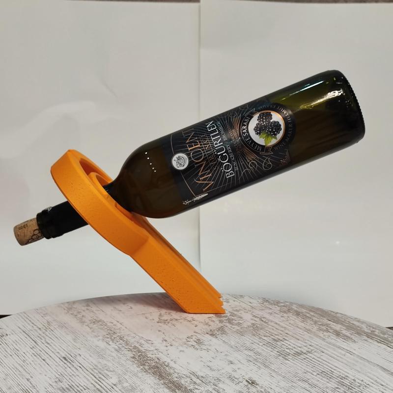 Artistic balanced bottle holder