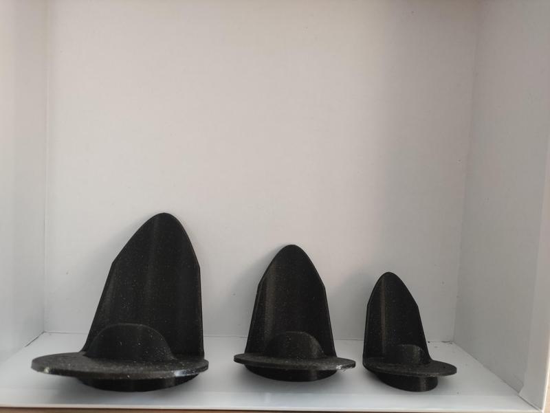 Inclined champagne bottle holder.