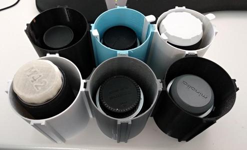 Lens holder for camera bag