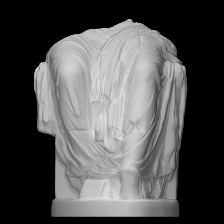 Fragment of a seated statue