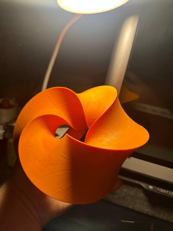 Twisted Toroidal Arrays