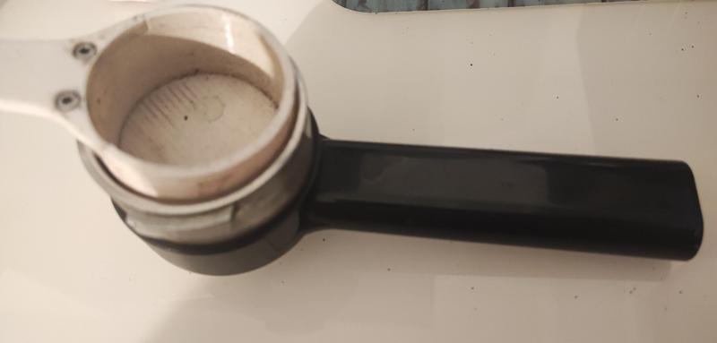 Coffee machine spoon and press