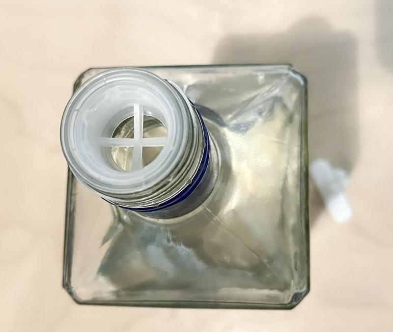 Liquor bottle flow restrictor puller tool