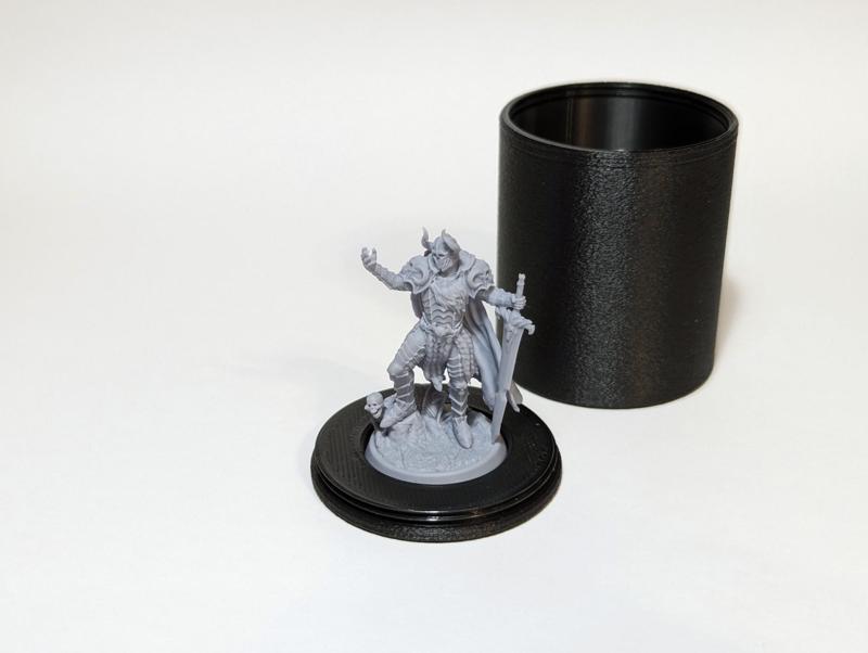 A round box for a tabletop miniature