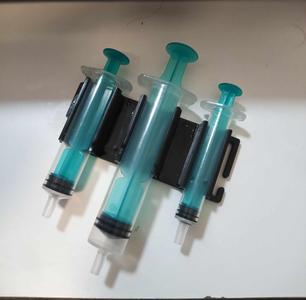 Syringe holder for Molle system