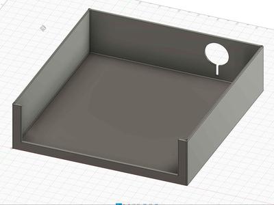 A box with a hole for charging cables.