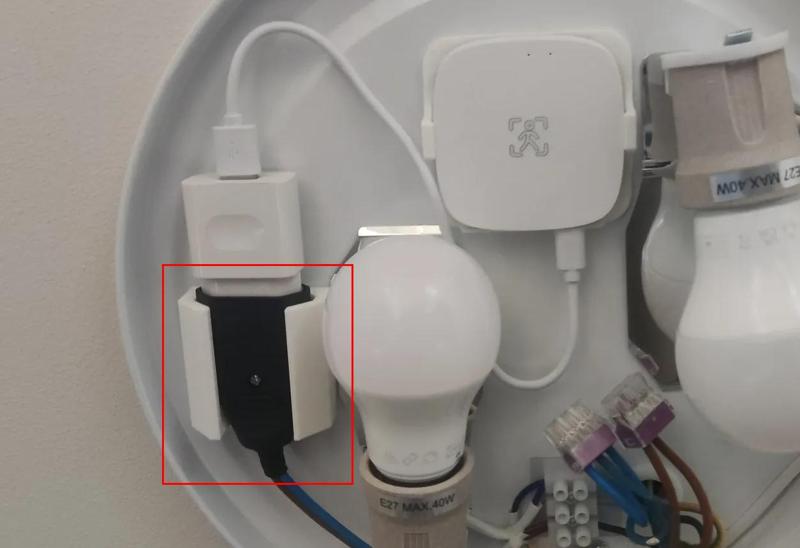 Extension cable plug holder