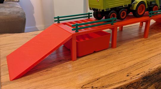 Ramp with tipping grid