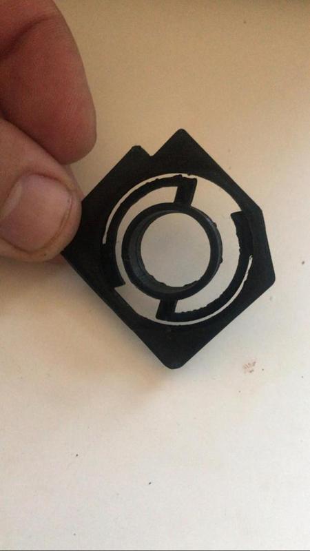 Resorte botón encendido lavarropas Trom