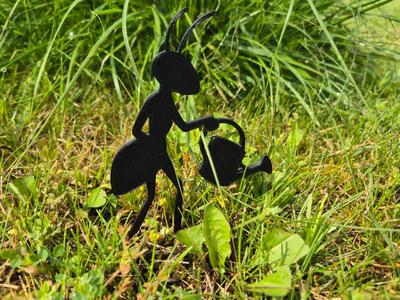 Garden Ant Sculpture with a watering can