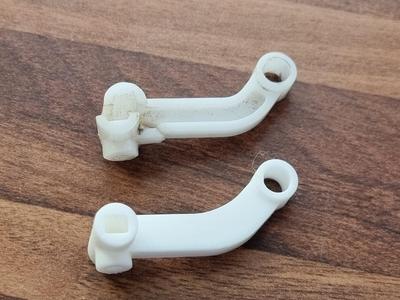 Replacement arm for AC device