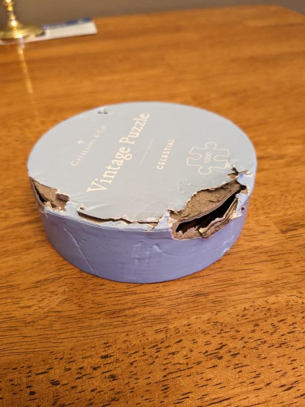 Jigsaw Puzzle box lid - or - Getting poochie out of hot water