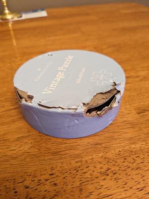 Jigsaw Puzzle box lid - or - Getting poochie out of hot water