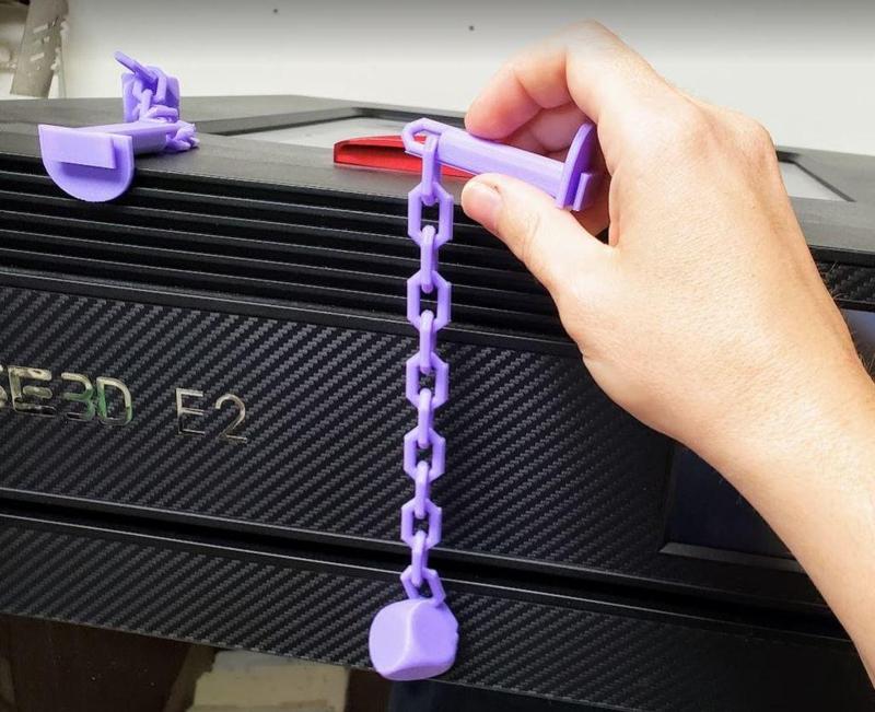 Rattle toy on a chain and foot toy for birds