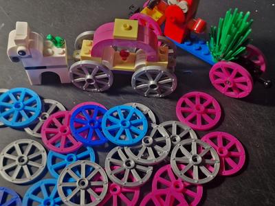 Chariot wheels for bricks construction set