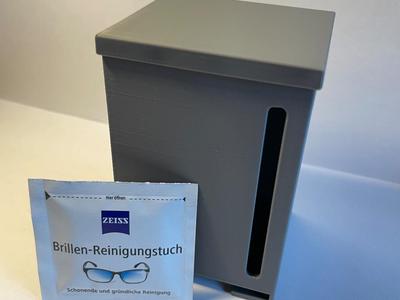 Dispenser for eyeglass wipes, etc. 