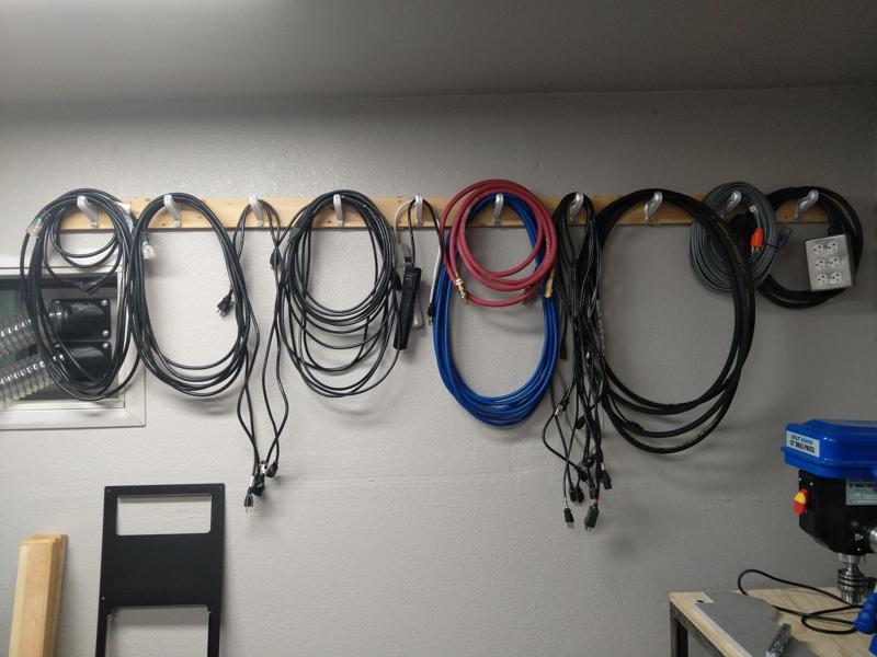 Cord and hose hanger