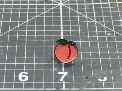 peach enamel pin