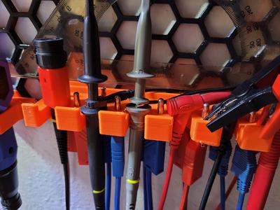 Cable holder for Honeycomb storage wall