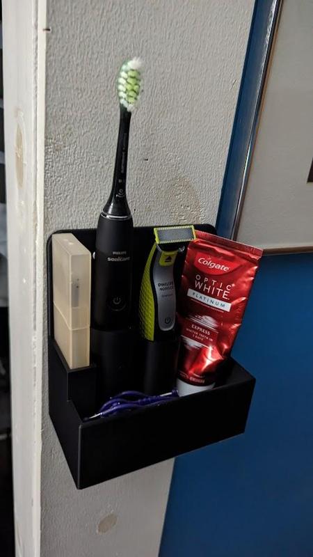 Toiletry wall organizer