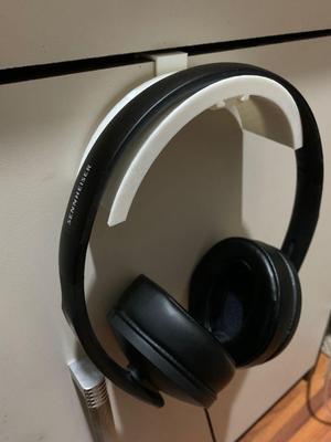 Updated - Hanger for headphones with replaceable tips for the door and shelf.