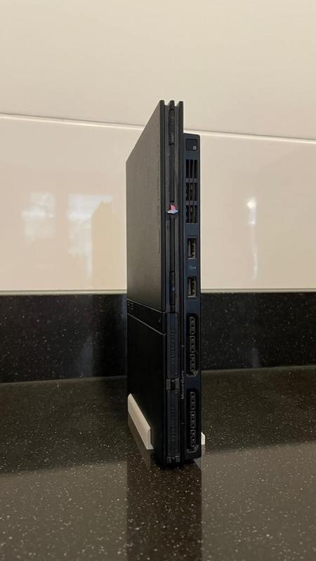 PS2 Slim + 2 memory cards vertical stand