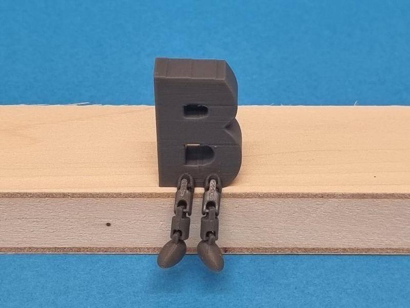 B with articulated legs