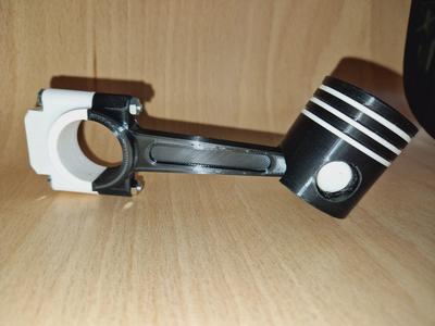 Piston and connecting rod assembly