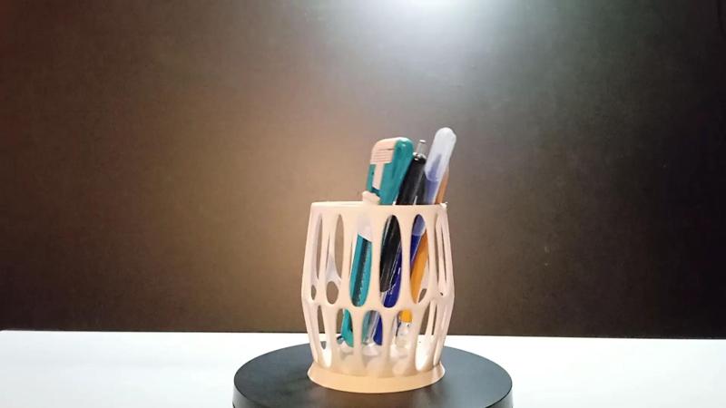 Pencil cup with hole