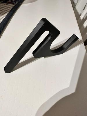 Woom kid bike short and long hook to carry room kid bike at a cargo bike