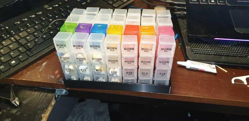 dosset pill box holder 