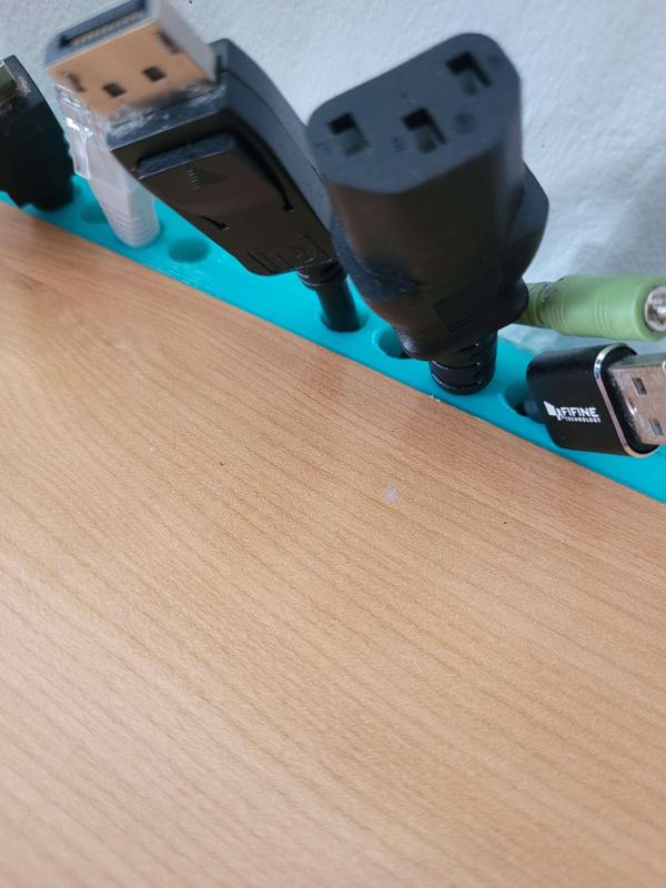 🧩 Cable organizer - Sturdy mounting behind desk