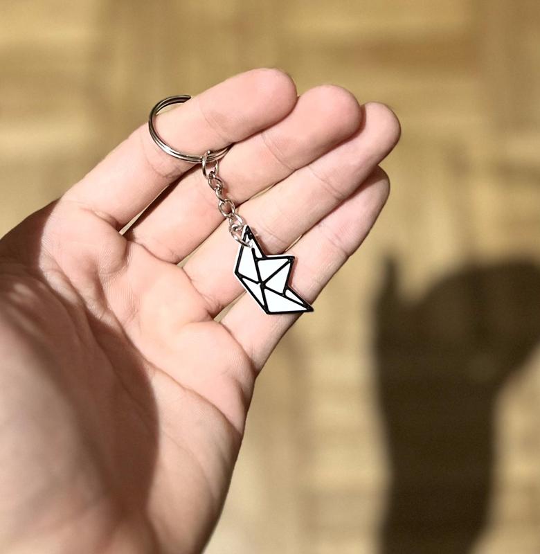Paper ship keychain