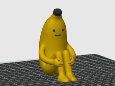 Sitting sad banana figure