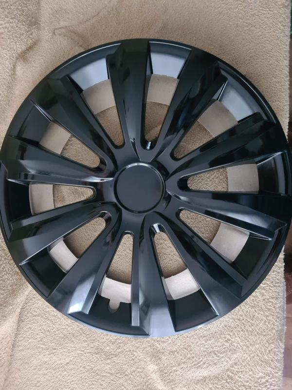 Toyota logo covers for 15" hubcaps by Jestic, model Delta Black