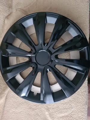 Toyota logo covers for 15" hubcaps by Jestic, model Delta Black