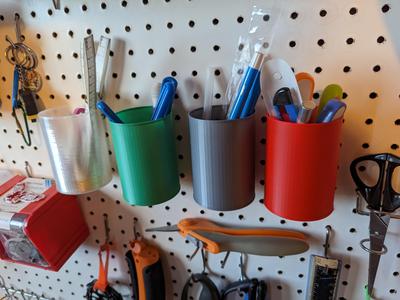 Light weight can shaped container for pegboard