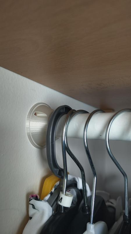 Closet rod holder