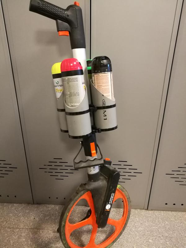 Marking paint holder for measuring wheel