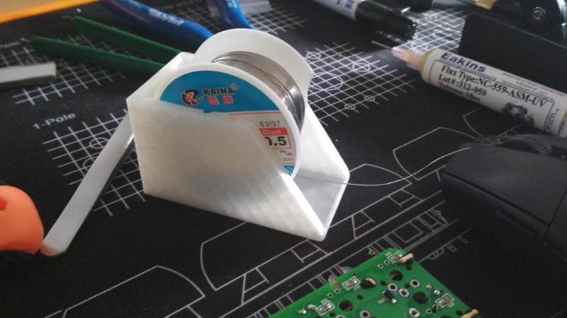 Solder roll holder
