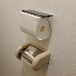 Roll-keeping phone table for toilet walls