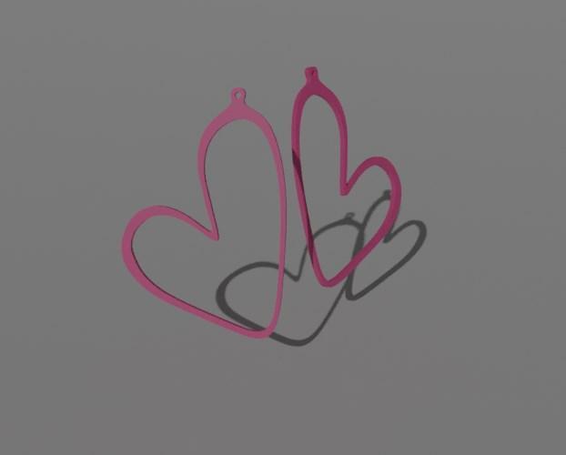 Slim heart-shaped hollow earrings with holes.