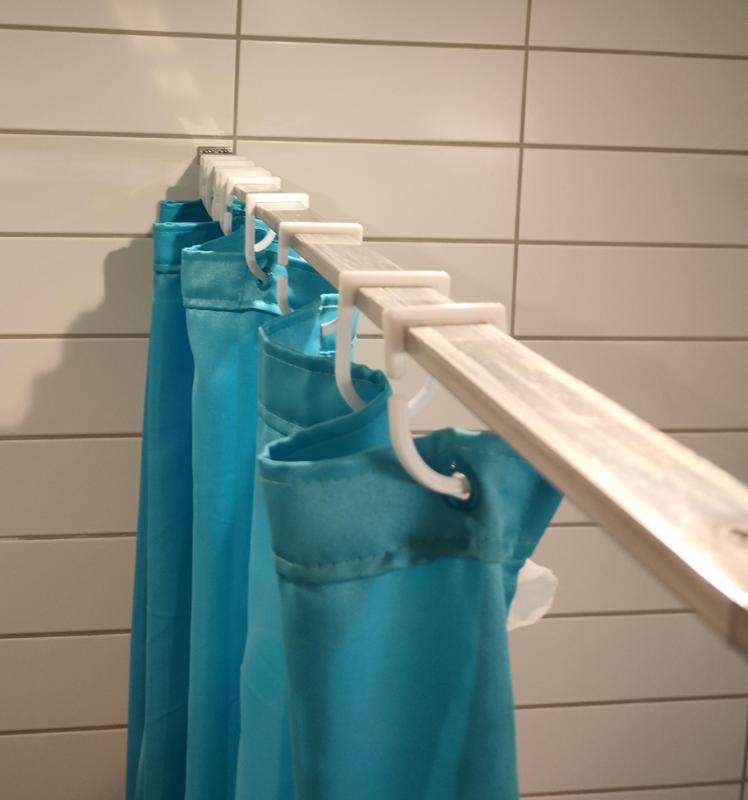 Shower curtain hanger