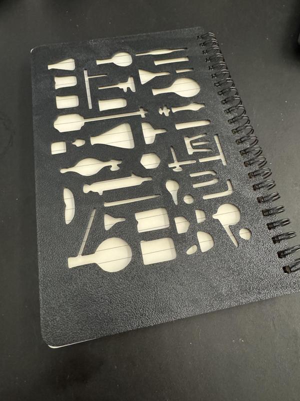 Notebook cover frame for stencils