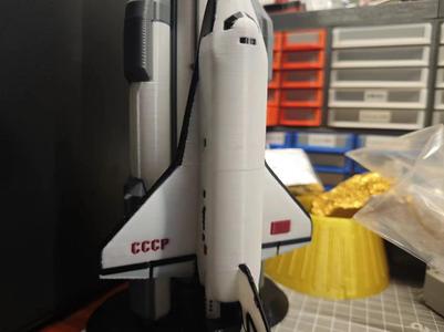 Buran with title and red flag