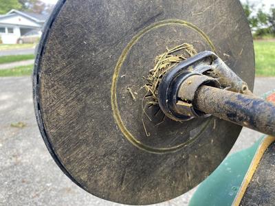 Wheel cap for Scott's fertilizer spreader