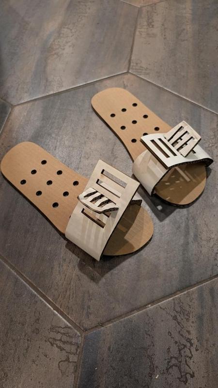 Laser cut cardboard flip flops