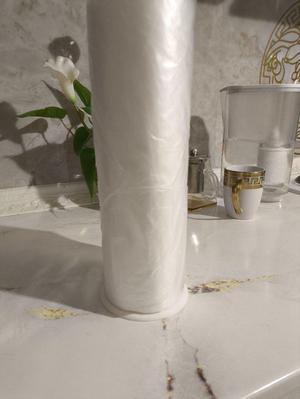 Paper towel/cellophane bags holder